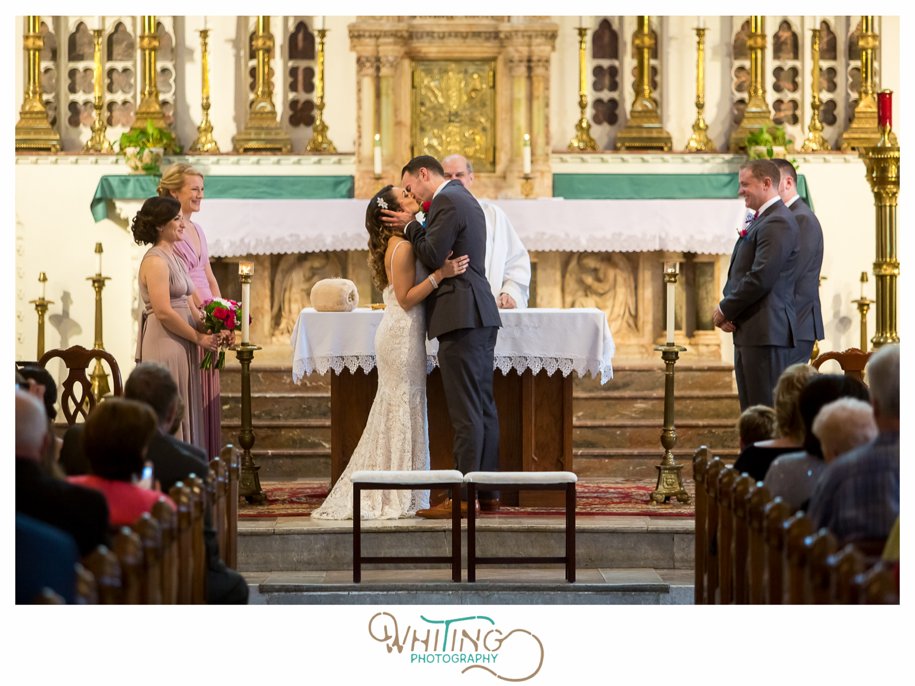 bride and groom first kiss Sacred Heart of Jesus Parish Cambridge