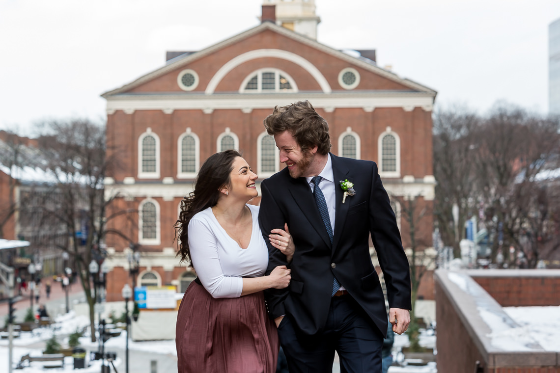 wedding couple on steps of city hall in front of faneuil hall