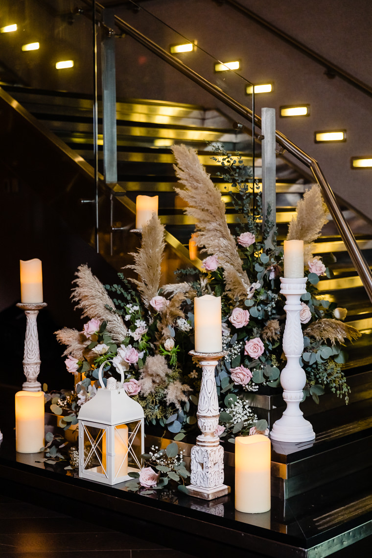 Decorated staircase with candles at State Room Boston